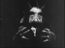 Lucifero che sbrana un dannato.